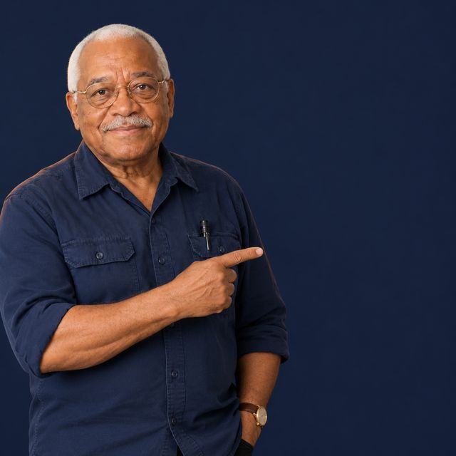 Clarence Hollins pointing to the savings figures